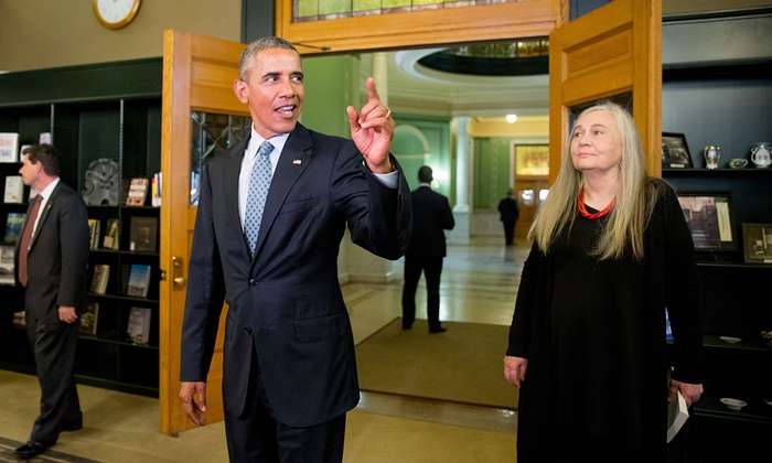 Barack Obama arriving at the State Library of Iowa to interview Marilynne Robinson (right).; links to news story