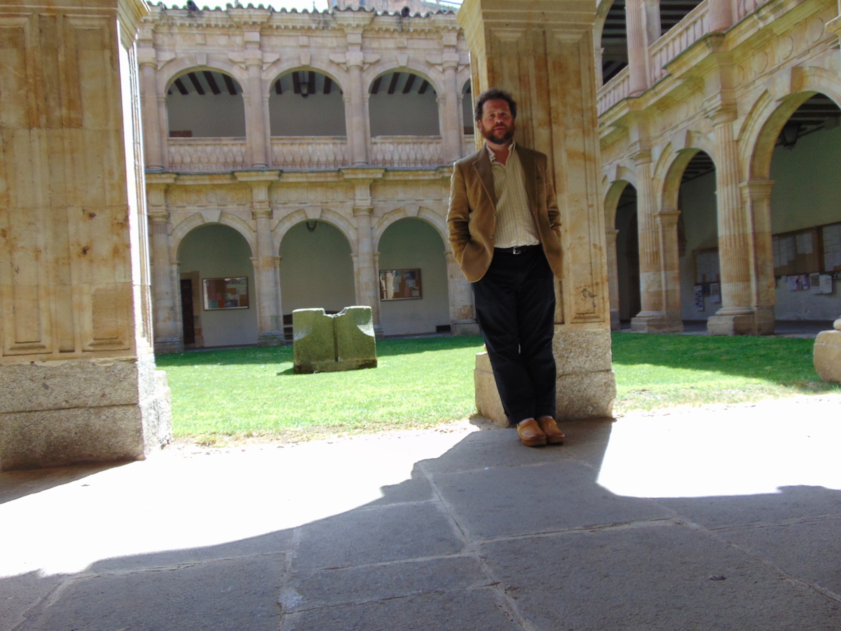 Timothy Cook stands in a courtyard in Salamanca, Spain