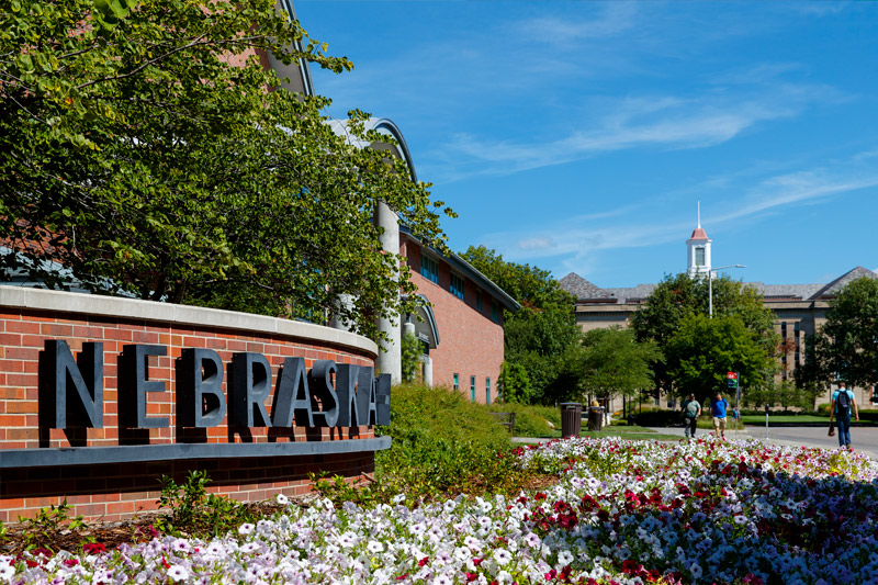 Ground level photo of Van Brunt Visitors Center with Library cupola in background